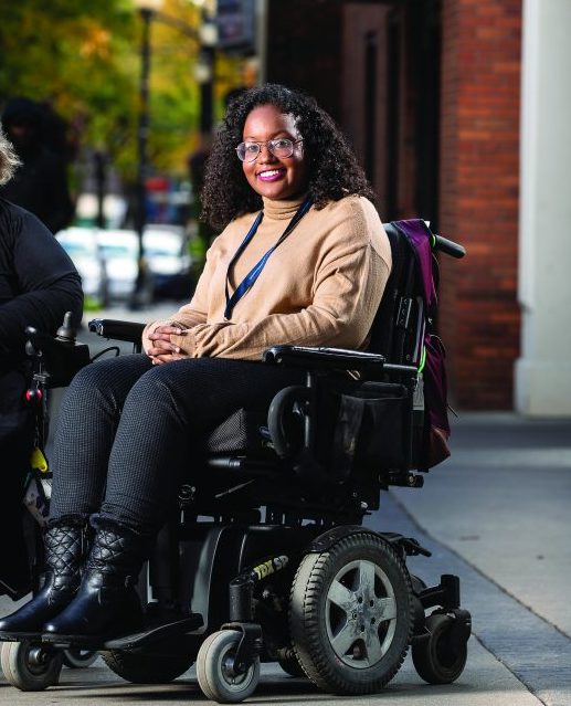 Sarah Jama in a wheelchair